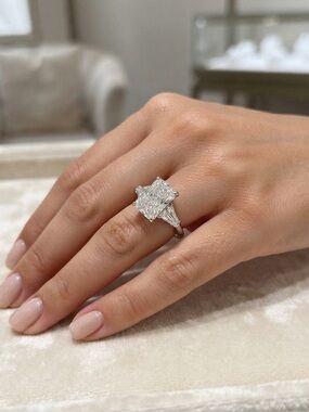 4.04 Carat radiant lab diamond on platinum. With .5 ct side  diamonds. New